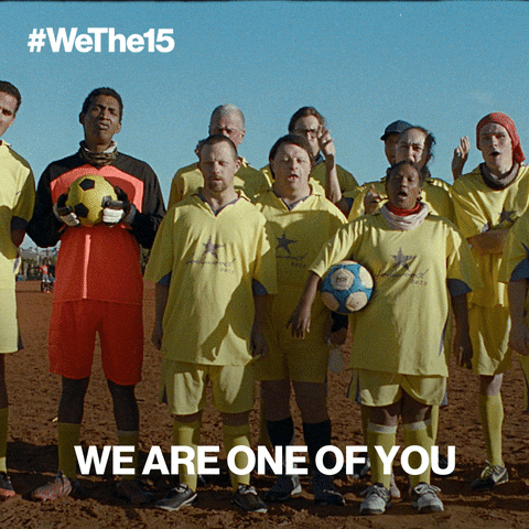 A diverse team of athletes with disability celebrating together in a WeThe15 campaign clip