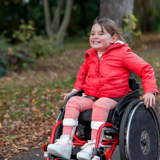 Smiling NDIS participant